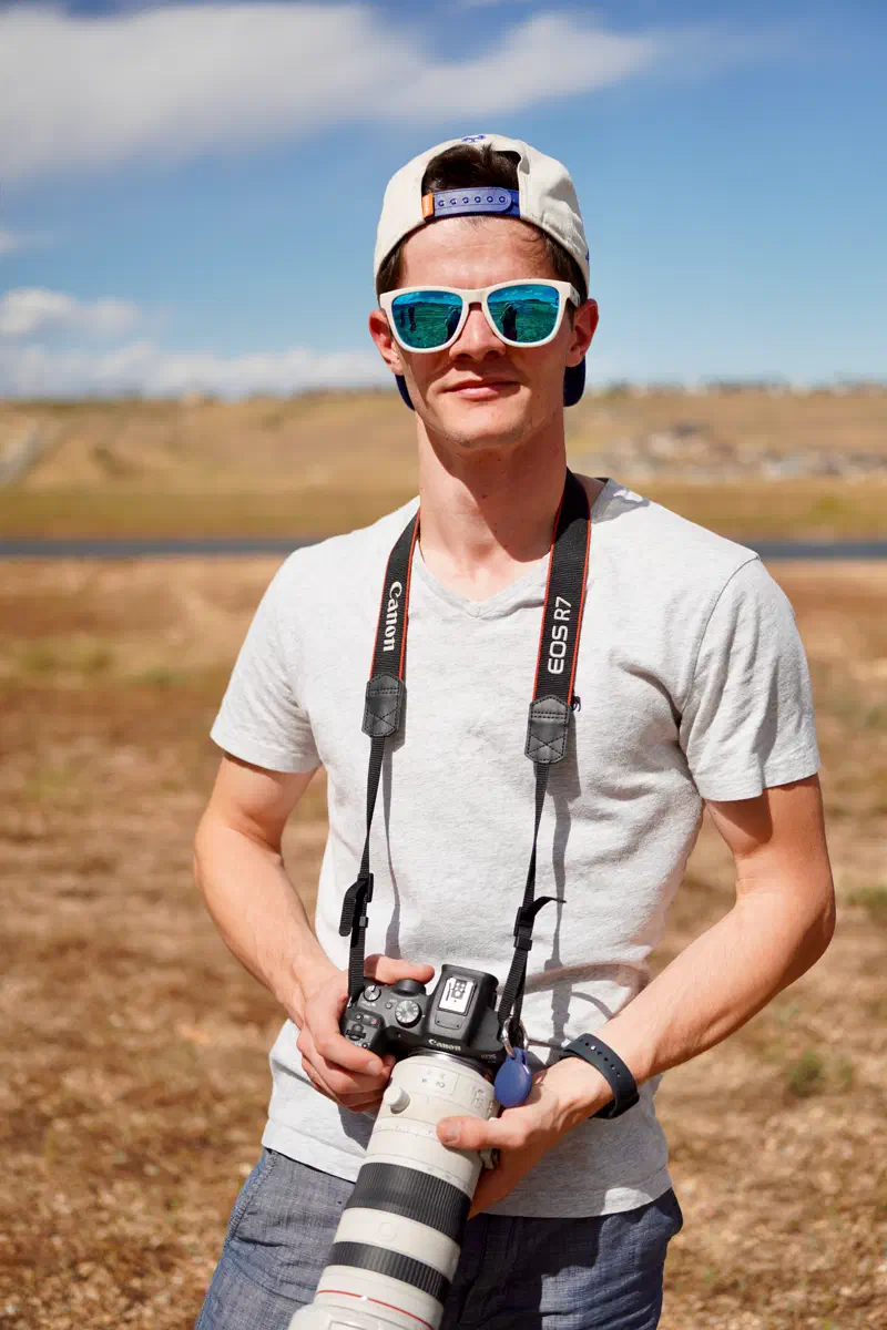 AJ La Barca holding a camera